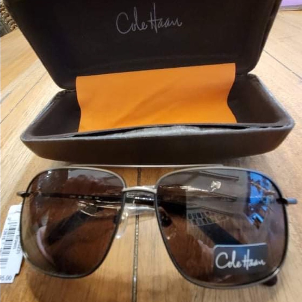 ColeHaan AviatorSunglasses w/original case. New,never worn. Authentic! Man/Woman